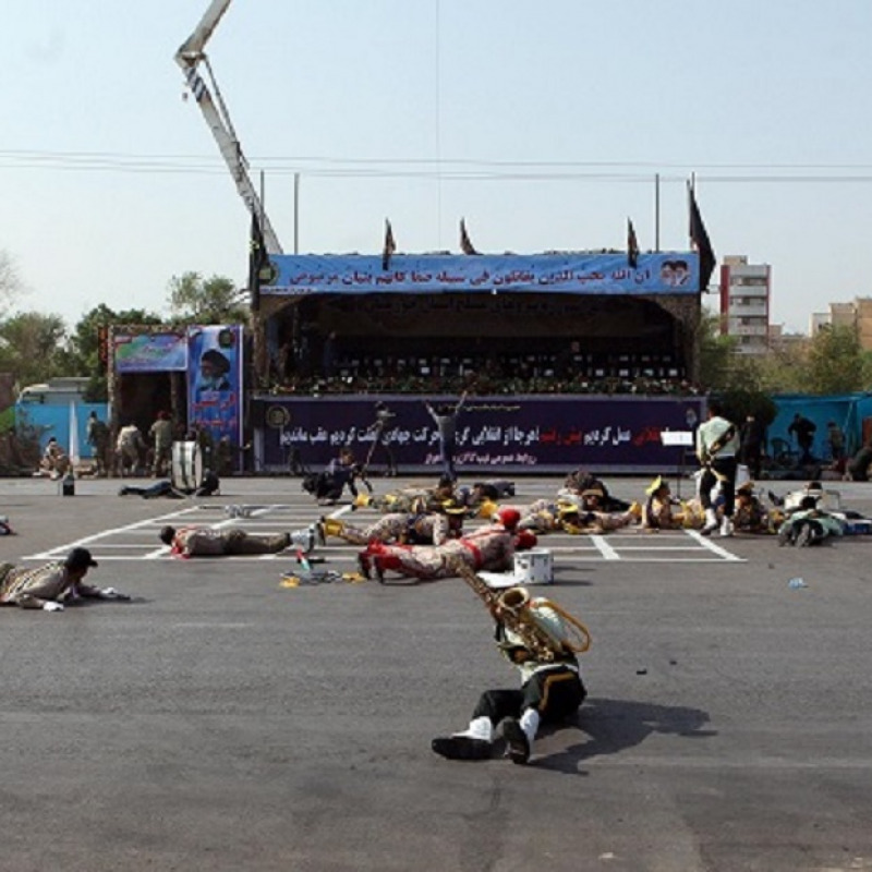 epa07038534 Iranian soldiers on the ground as a terror attack take place during a military parade in the city of Ahvaz, southern, Iran, 22 September 2018. Media reported that Gunmen have opened fire during an Iranian military parade in the south-western city of Ahvaz, killing several people. EPA/BEHRAD GHASEMI