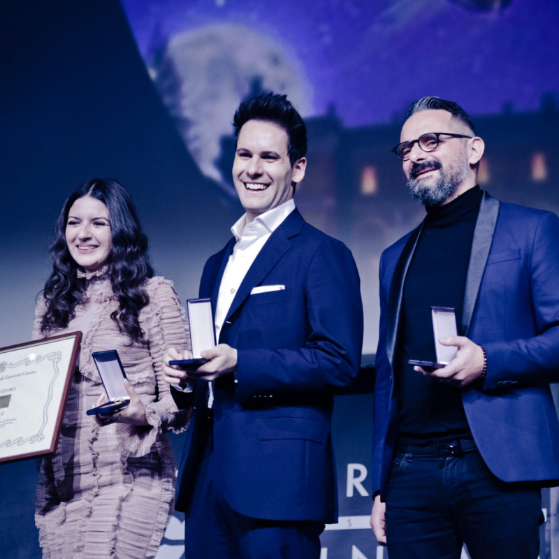 Sofia Scalia, Luigi Calagna e il regista Gianluca Leuzzi premiati (foto profilo Fb Giornate Professionali di Cinema Energy)
