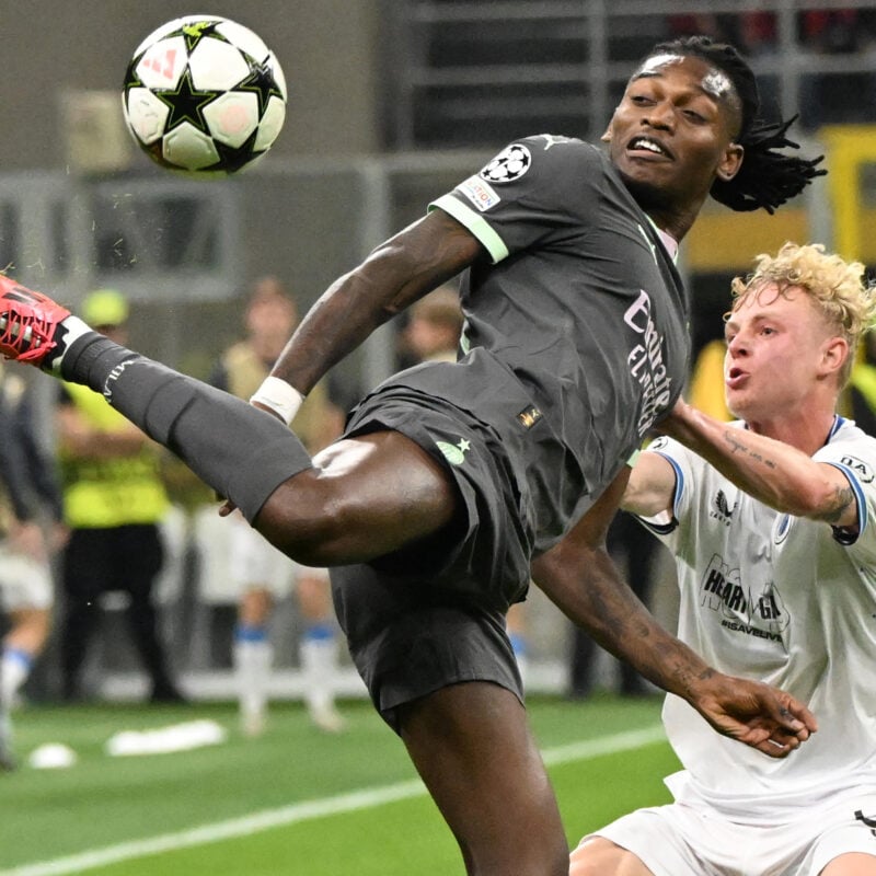 AC Milans forward Rafael Leao (L) and Club Brugge KSVs defender Joaquin Seys struggle for the ball during their UEFA Champions League match at the Giuseppe Meazza Stadium in Milan, Italy, 22 October 2024. ANSA/DANIEL DAL ZENNARO